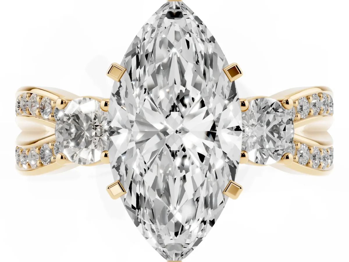 Three-Stone Marquise Cut Cut Diamond Twist Band with Prong Setting Yellow gold