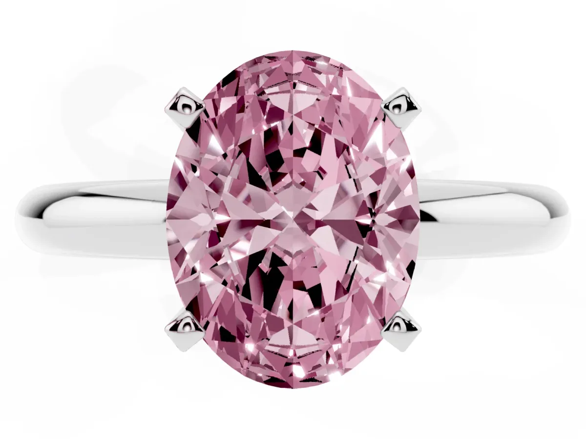 Fancy Pink Oval Cut Diamond Solitaire Engagement Ring with Round Band and Four-Prong Setting Platinum