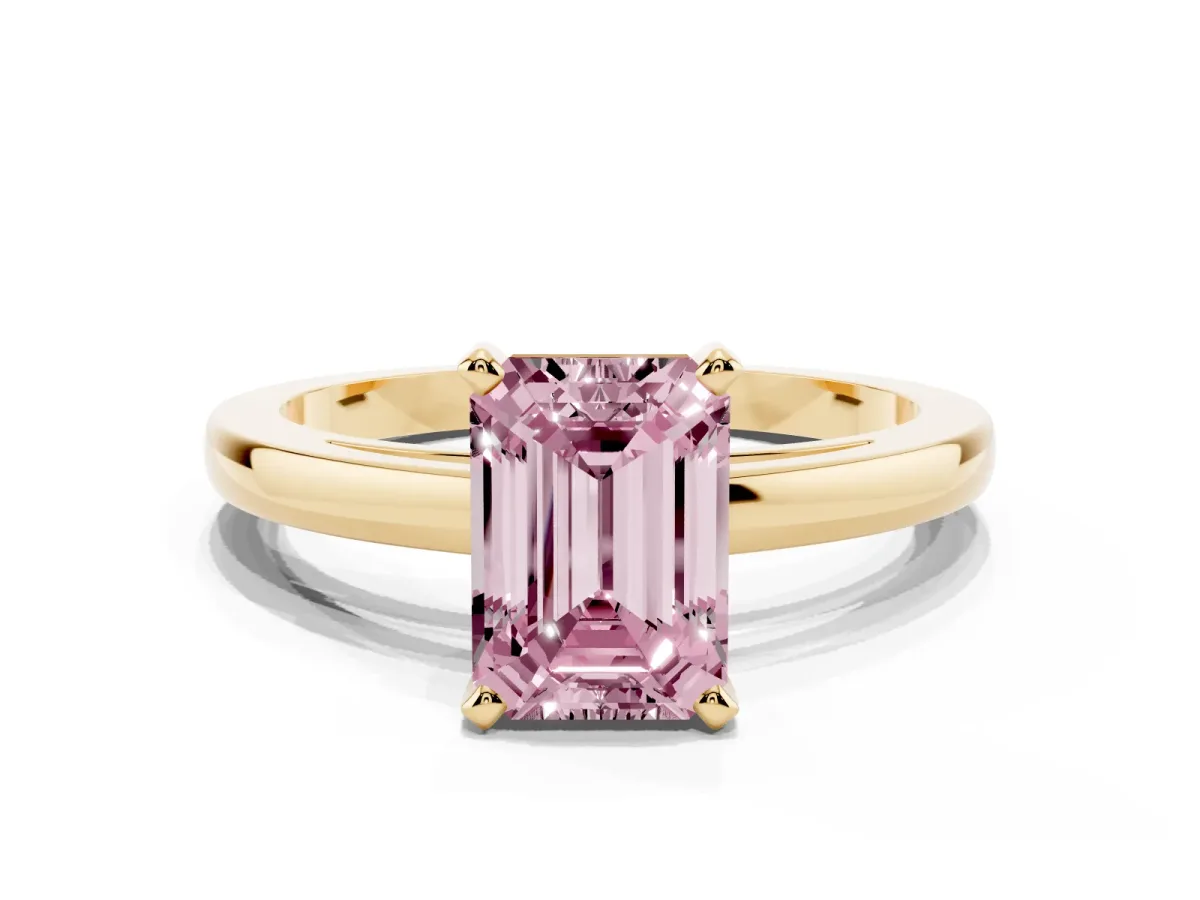 Fancy Pink Emerald Cut Solitaire Diamond Engagement Ring with Four-Prong Setting on a Classic Band Yellow gold