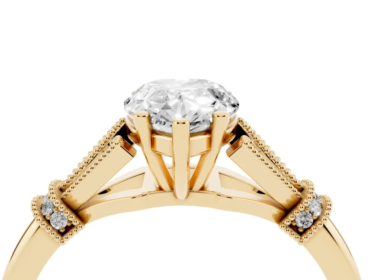 Pear Cut Diamond Solitaire Ring with Floral Filigree and Pave Accents Yellow gold