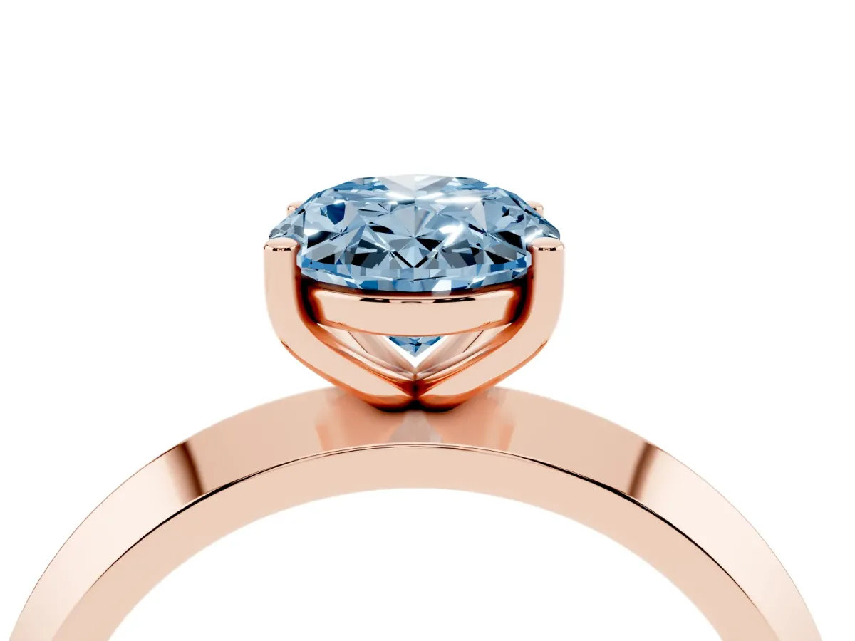 Fancy Blue Oval Cut Cut Solitaire Engagement Ring with Flat Band and Four-Prong Setting Rose gold