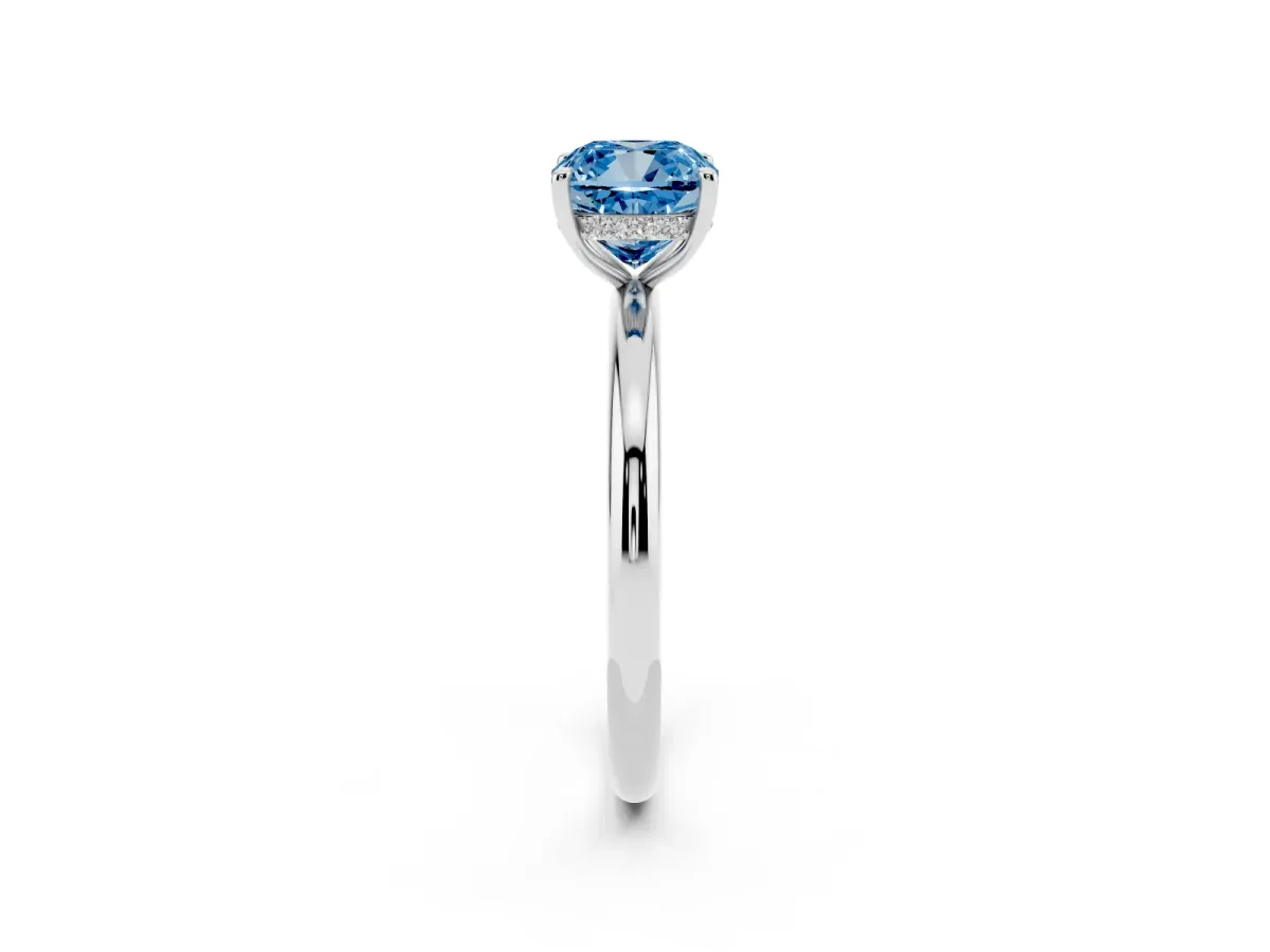 Fancy Blue Cushion Cut Diamond Solitaire Ring with Thin Band and Four-Prong Setting Platinum