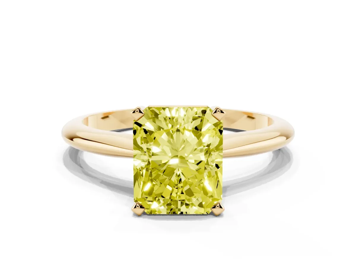 Fancy Yellow Radiant Cut Cut Solitaire Ring with Four-Prong Setting on a Classic Band Yellow gold