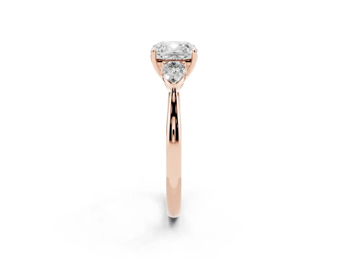 Three-Stone Cushion Cut Brilliant Diamond Solitaire Ring with Tapered Band and Four-Prong Setting Rose gold