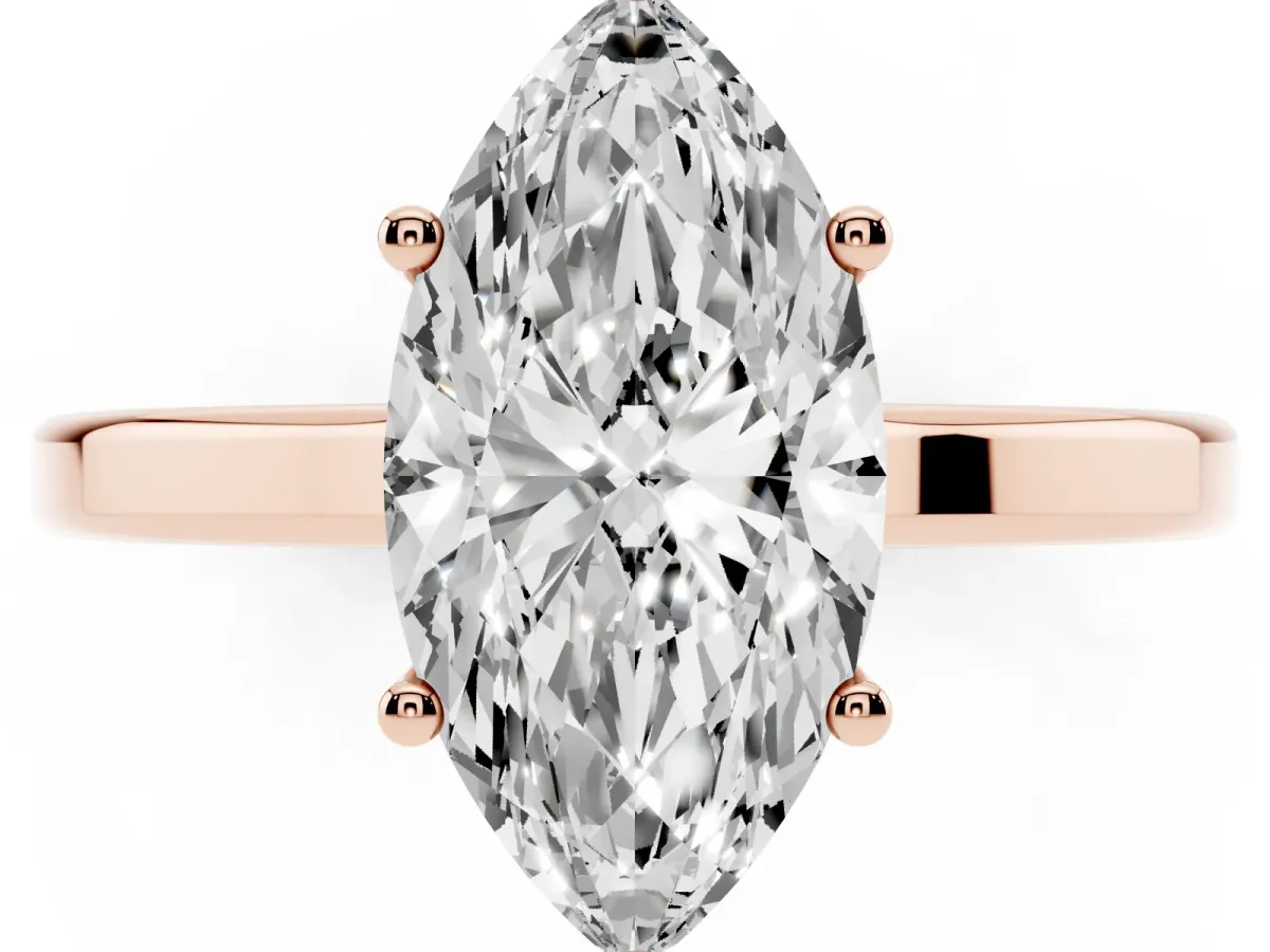 Marquise Cut Cut Solitaire Engagement Ring with Four-Prong Setting on a Classic Band Rose gold