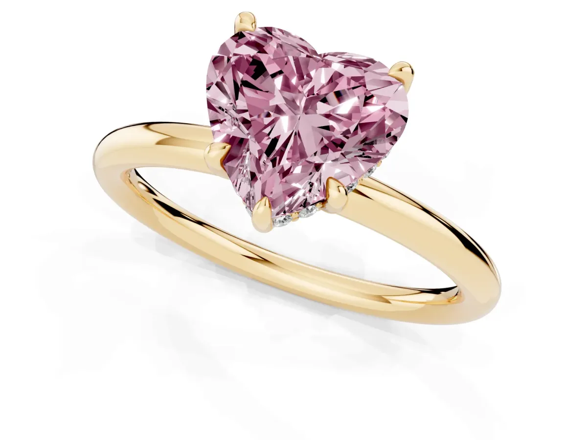 Fancy Pink Heart Cut Diamond Solitaire Ring with Thin Band and Four-Prong Setting Yellow gold