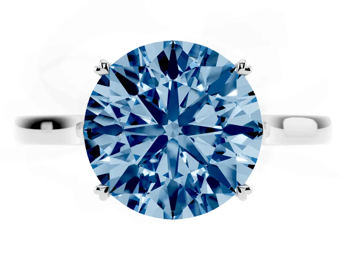 Fancy Blue Round Cut Solitaire Heart Prong Engagement Ring with Tapered Band Silver