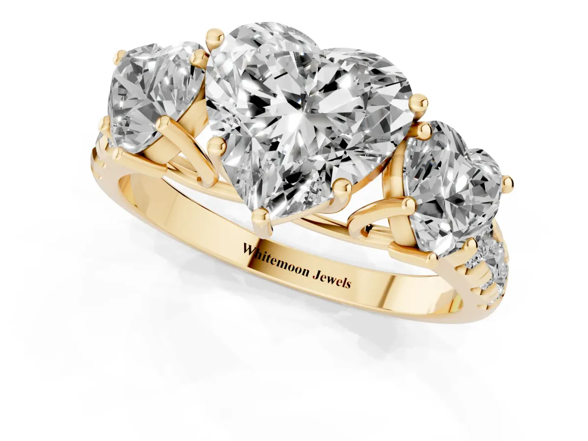 Three-Stone Heart Cut Diamond Pavé Band with Prong Setting Yellow gold