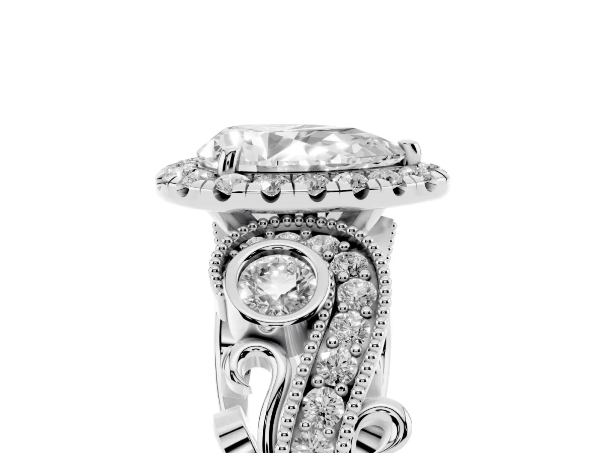 Pear Cut Halo Diamond Ring with Milgrain and Bezel Accents on a Split Shank Band Platinum