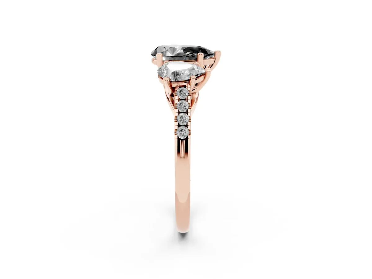 Fancy Black Three-Stone Pear Cut Diamond Ring with Round Pavé Band and Prong Setting Rose gold