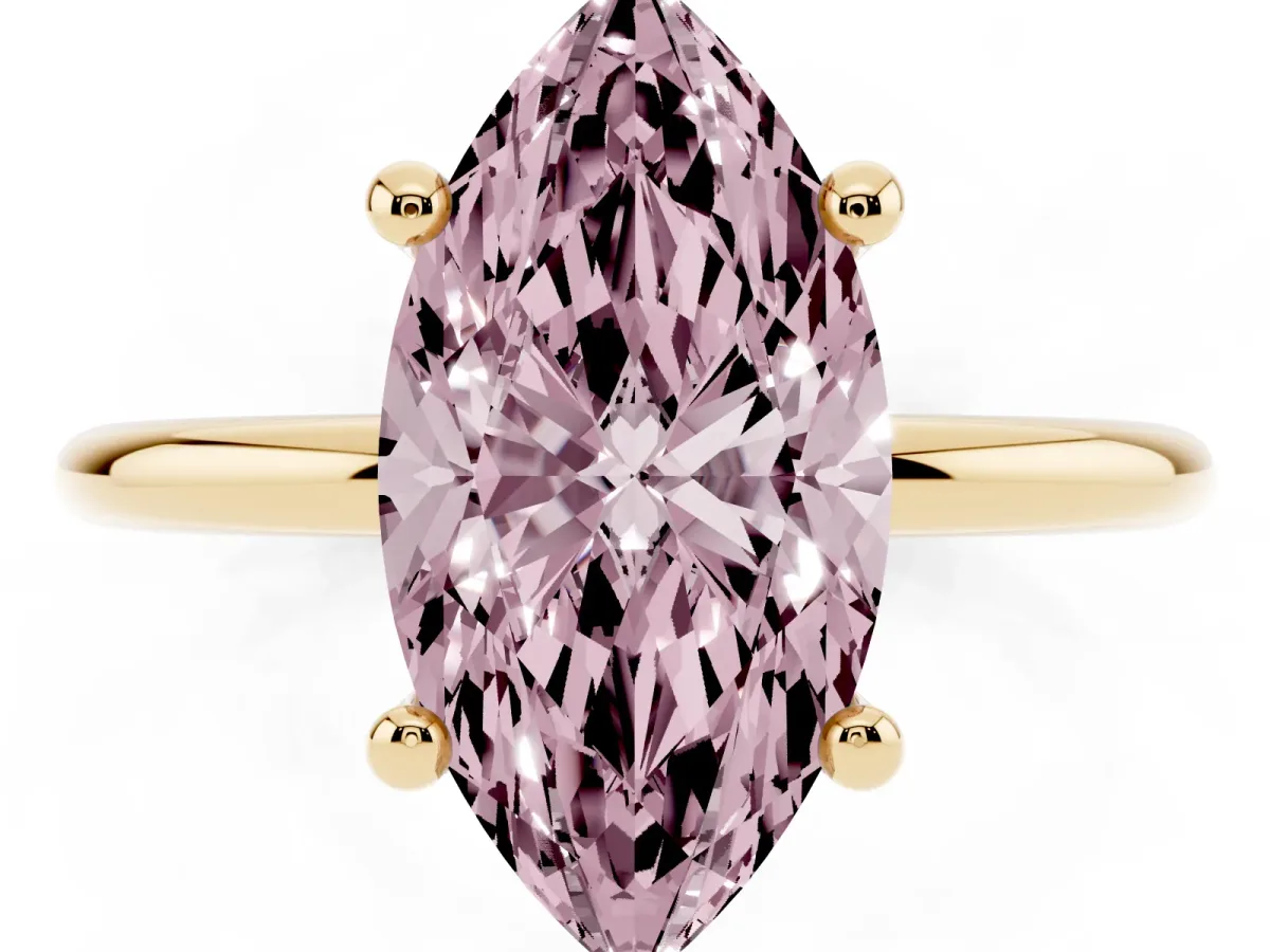 Fancy Pink Marquise Cut Solitaire Diamond Ring with 4-Prong Setting on a Classic Band Yellow gold