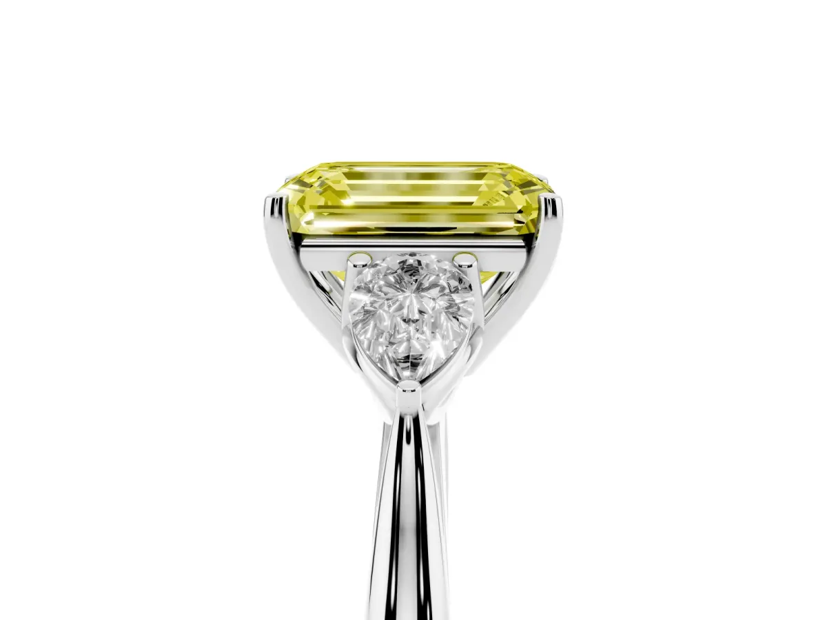 Fancy Yellow Emerald Cut Diamond Three-Stone Ring with Pear Side Stones and Prong Setting Silver