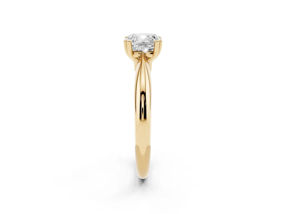 Cushion Cut Cut Solitaire Engagement Ring with Tapered Band and Four-Prong Setting Yellow gold