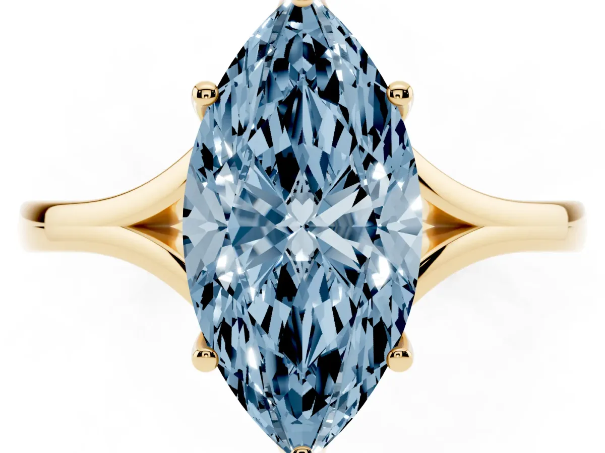Fancy Blue Marquise Cut Solitaire Diamond Ring with Six-Prong Setting and Tapered Band Yellow gold