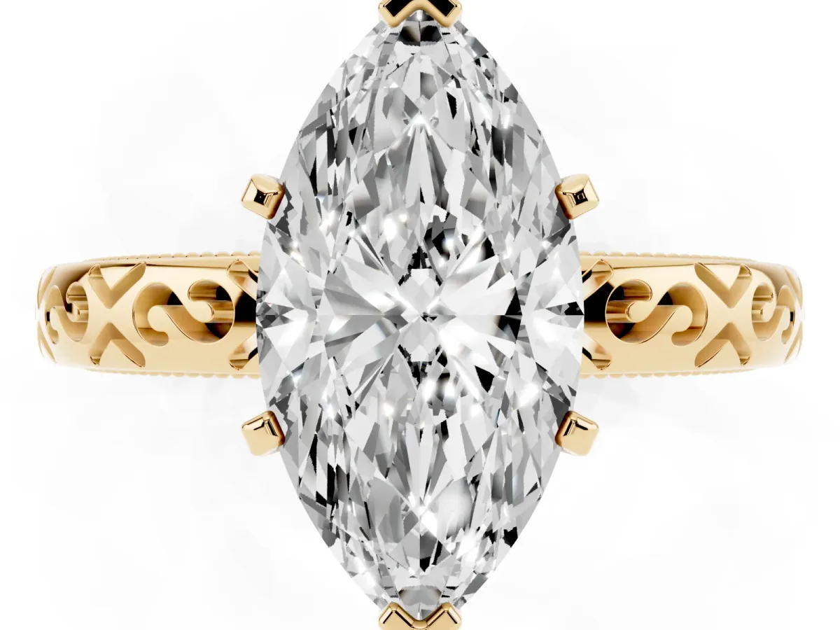Marquise Cut Solitaire Engagement Ring with Scrollwork Band and Four-Prong Setting Yellow gold
