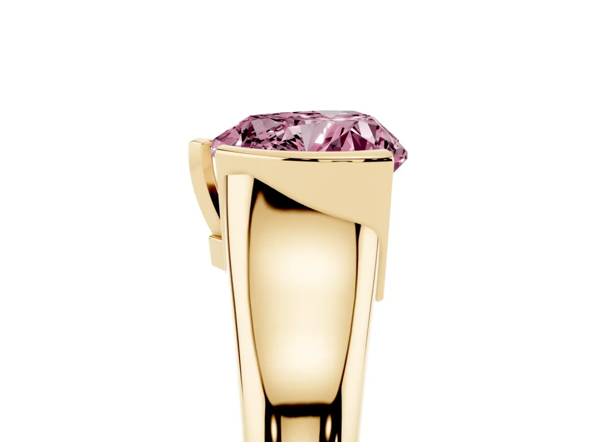Fancy Pink Heart Cut Solitaire Tension Set Diamond Ring with Split Shank Band Yellow gold