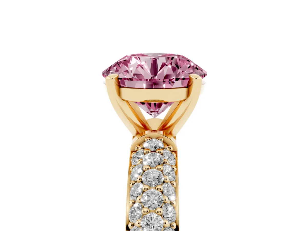Fancy Pink Round Cut Diamond Solitaire Ring with Prong Setting and Pavé Band Yellow gold