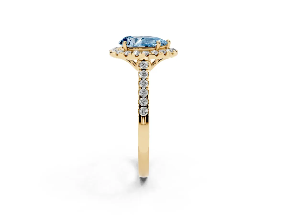 Fancy Blue Pear Cut Halo Pavé Diamond Engagement Ring with Four-Prong Setting Yellow gold