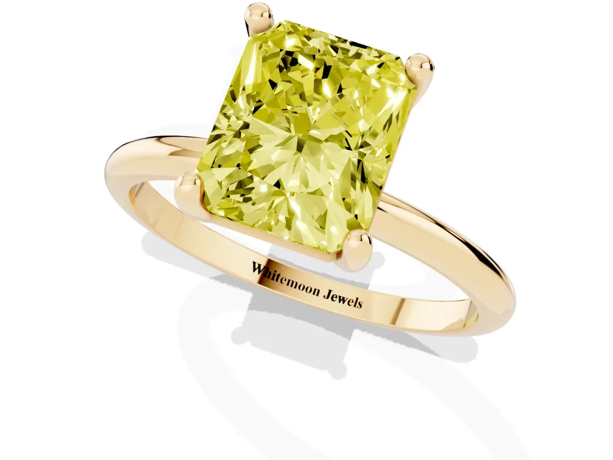 Fancy Yellow Radiant Cut Solitaire Diamond Ring with 4-Prong Setting on a Classic Band Yellow gold