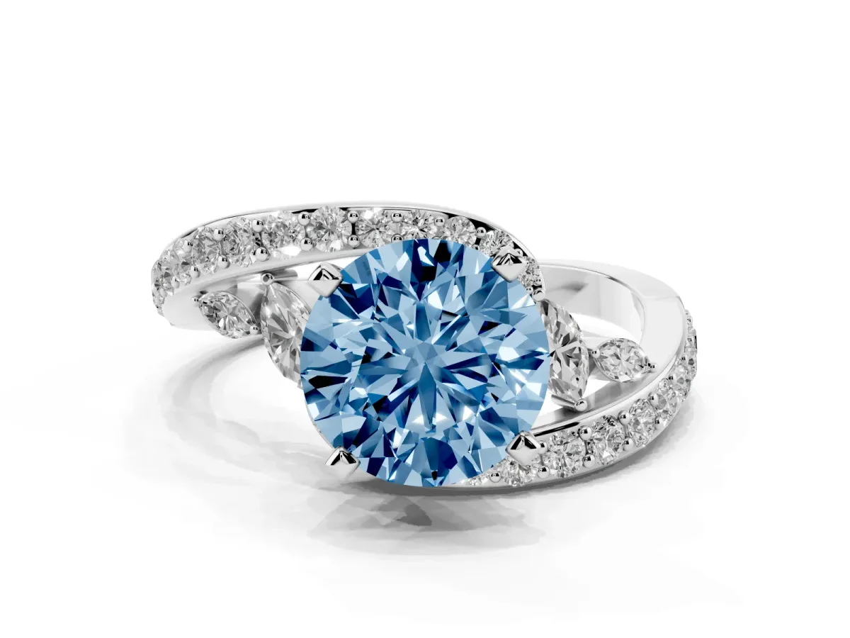 Fancy Blue Round Cut Solitaire with Pavé Twist Band and Four-Prong Setting Silver