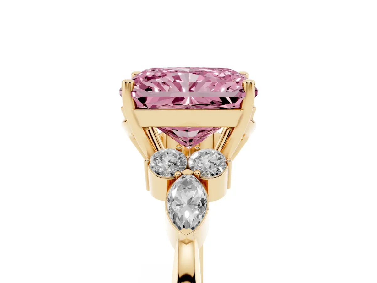Fancy Pink Radiant Cut Brilliant Diamond Solitaire Ring with Pear Side Stones and Four-Prong Setting Yellow gold