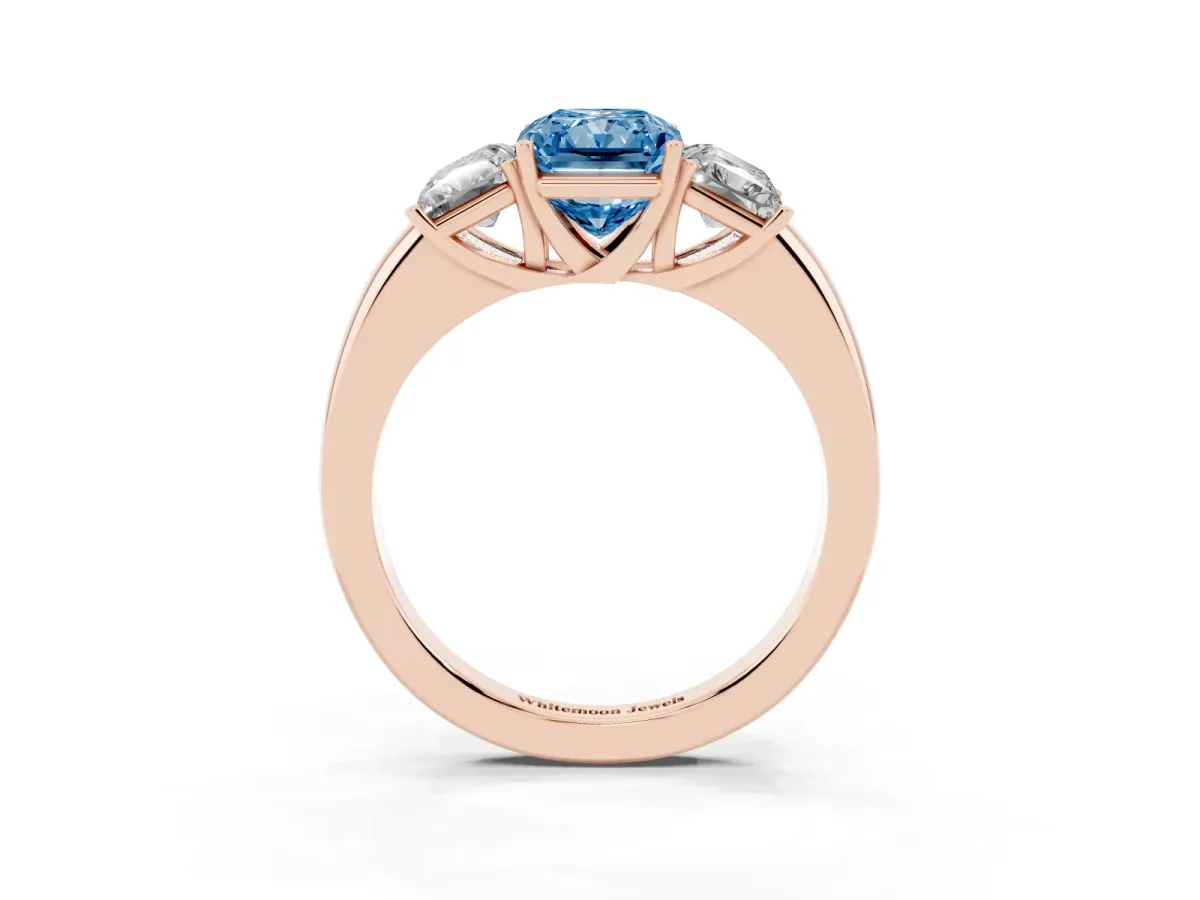 Fancy Blue Radiant Cut Diamond Three-Stone Ring with Four-Prong Setting and Classic Band Rose gold