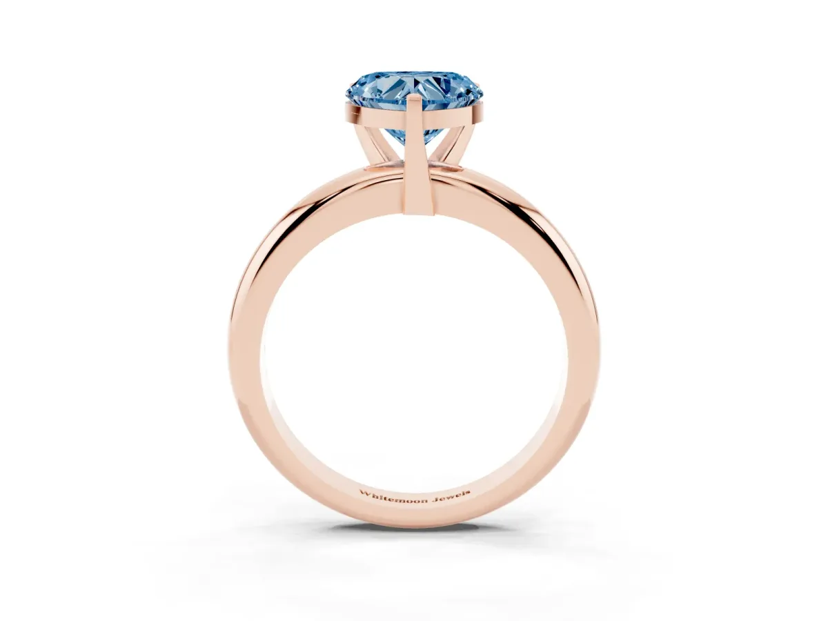Fancy Blue Heart Cut Diamond Solitaire Engagement Ring with Round Band and Four-Prong Setting Rose gold