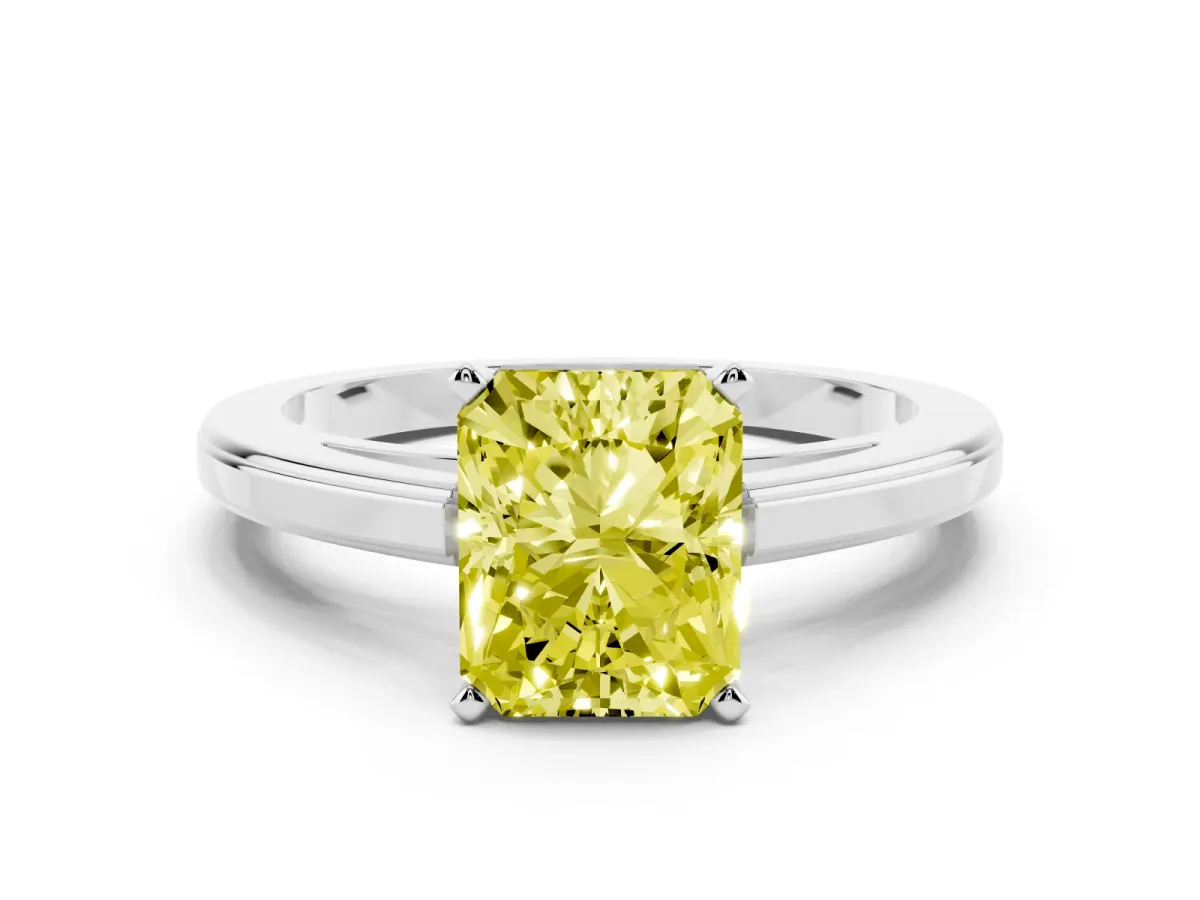 Fancy Yellow Radiant Cut Solitaire Diamond Ring with Four-Prong Setting and Classic Band Silver