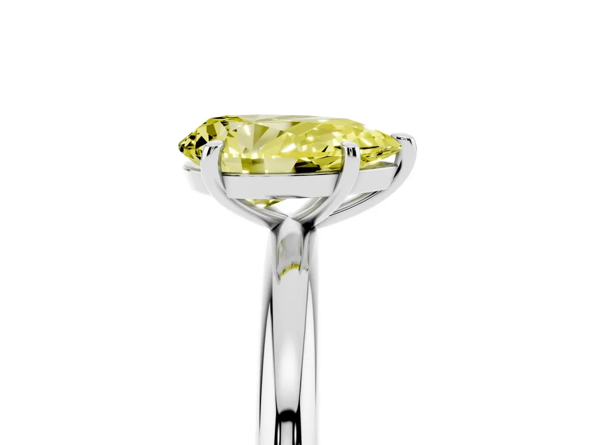 Fancy Yellow Pear Cut Solitaire Diamond Ring with Four-Prong Setting on a Plain Band White gold