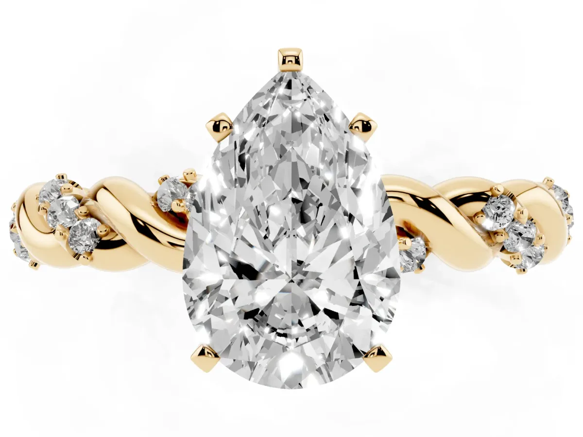 Pear Cut Diamond Solitaire Ring with Twisted Band and Pavé Accents Yellow gold