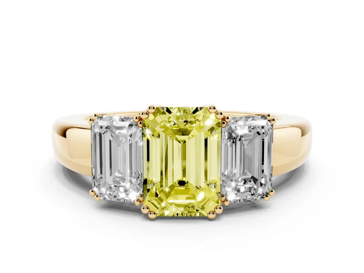 Fancy Yellow Three-Stone Emerald Cut Cut Diamond Ring with Channel Set Band and Four-Prong Setting Yellow gold