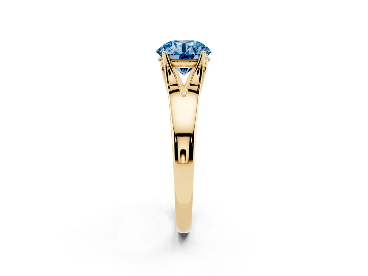 Fancy Blue Round Cut Solitaire Diamond Ring with Cathedral Band and Four-Prong Setting Yellow gold