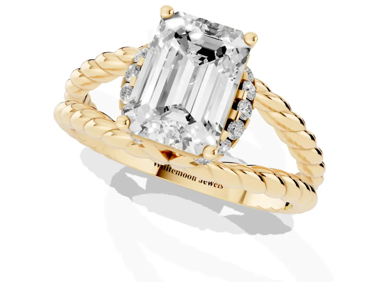 Emerald Cut Halo Twisted Band Four-Prong Ring Yellow gold