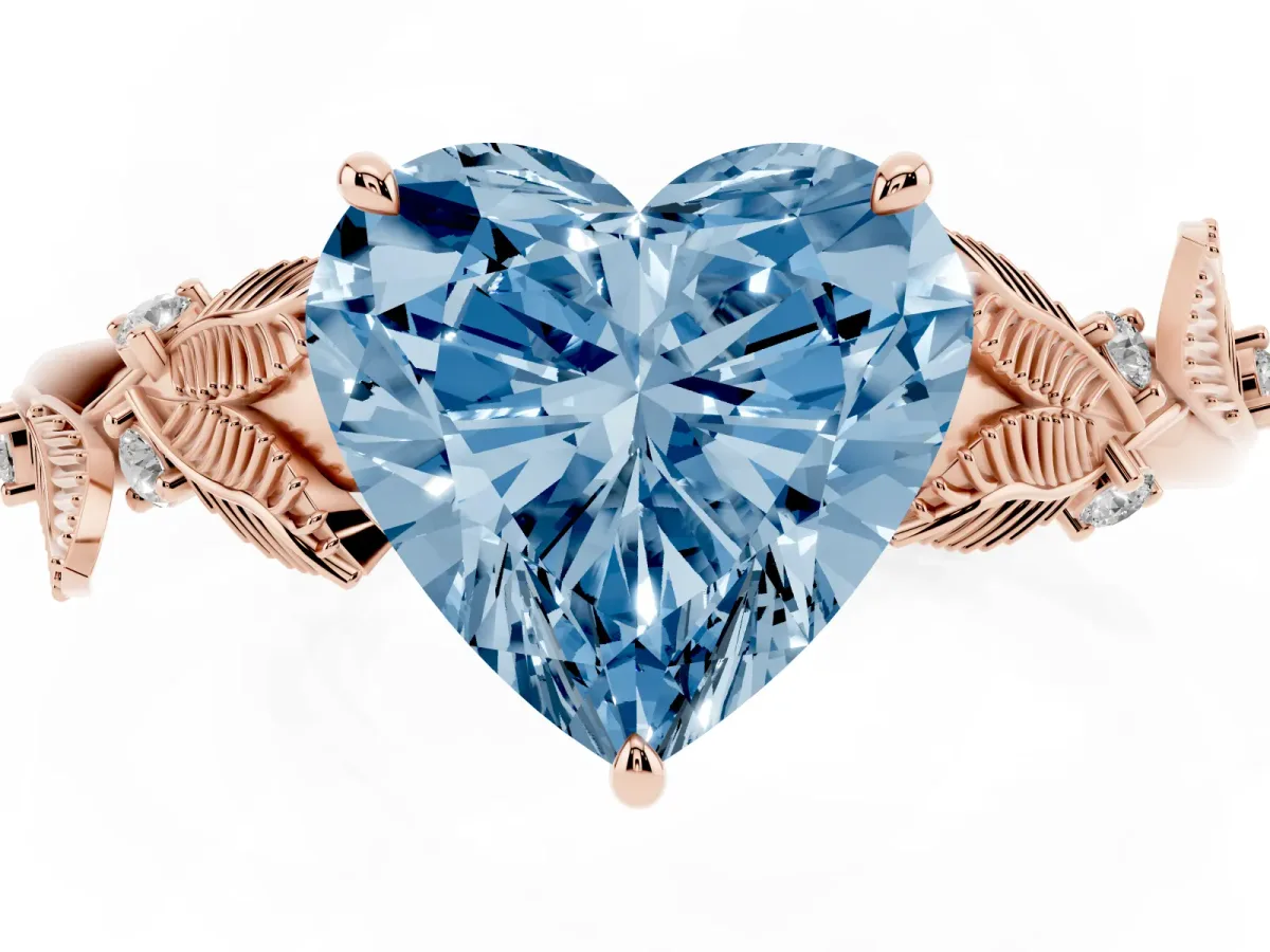 Fancy Blue Heart Cut Diamond Solitaire Ring with Leaf Motif Band and Four-Prong Setting Rose gold