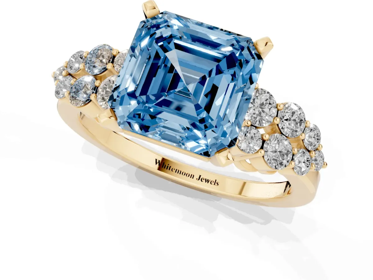 Fancy Blue Asscher Cut Cluster Diamond Engagement Ring with Pavé Band and Four-Prong Setting Yellow gold