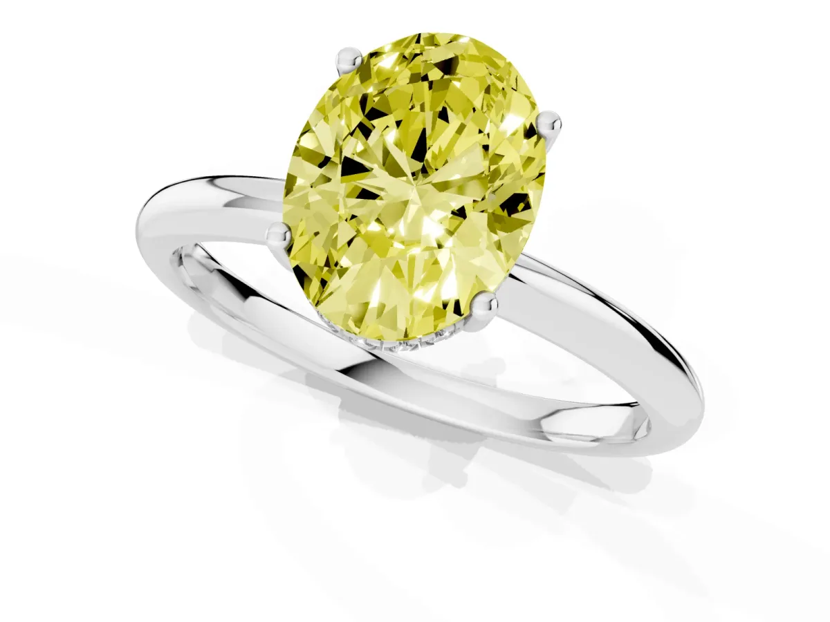 Fancy Yellow Oval Cut Cut Solitaire Engagement Ring with Four-Prong Setting and Classic Band Silver