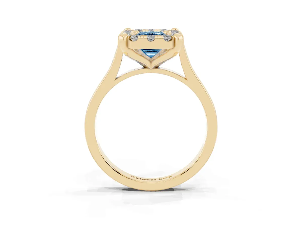 Fancy Blue Emerald Cut Diamond Cluster Halo Solitaire with Four-Prong Setting Yellow gold