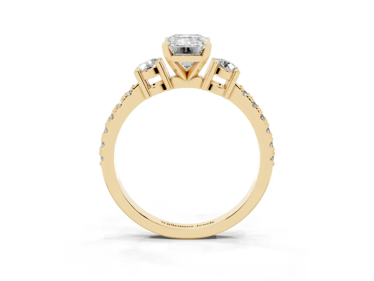 Emerald Cut Three-Stone Diamond Pavé Band with Prong Setting Yellow gold