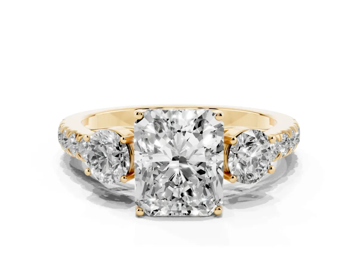 Radiant Cut Cut Diamond Three-Stone Ring with Round Side Stones and Pavé Band Yellow gold