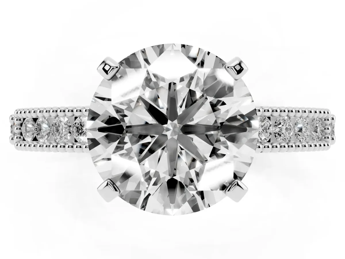 Round Cut Solitaire with Pavé Band and Four-Prong Setting Silver