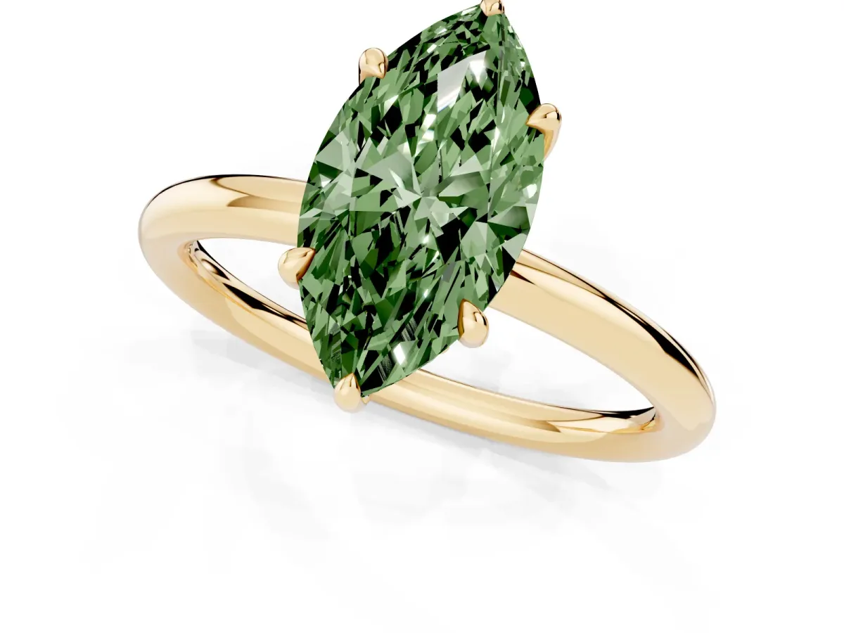 Fancy Green Marquise Cut Diamond Solitaire Ring with Thin Band and Four-Prong Setting Yellow gold