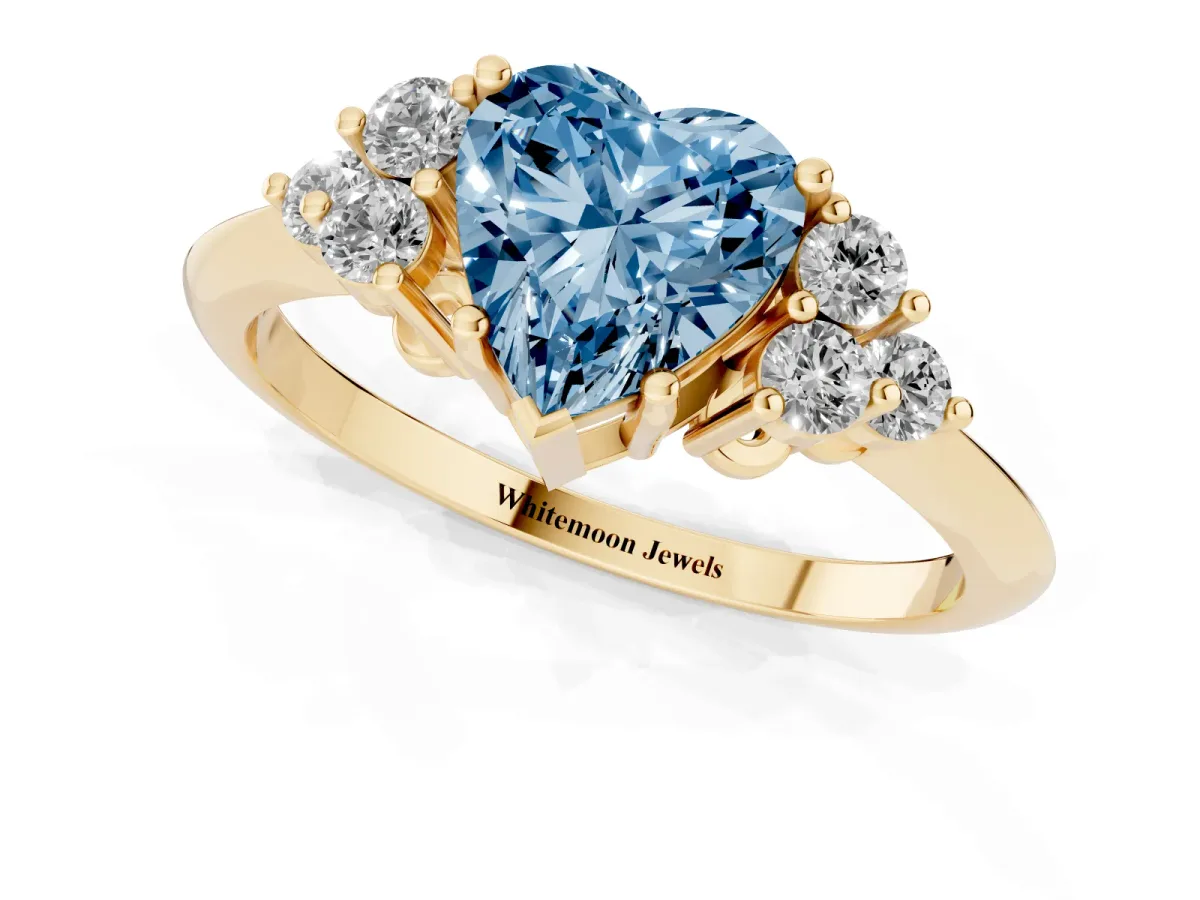 Fancy Blue Heart Cut Cut Diamond Cluster Ring with Solitaire Band and Four-Prong Setting Yellow gold