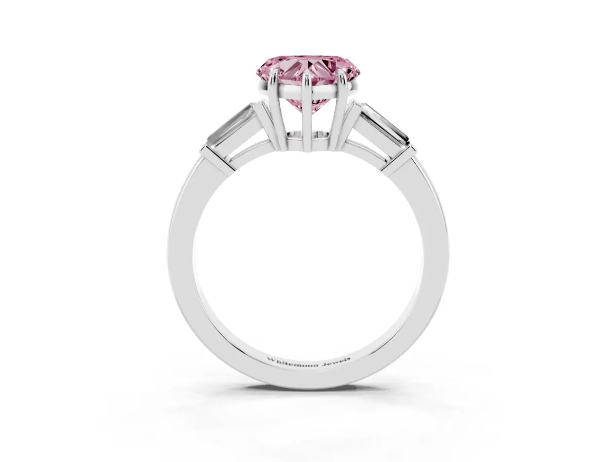 Fancy Pink Heart Cut Diamond Three-Stone Ring with Tapered Baguette Side Stones and Prong Setting Platinum