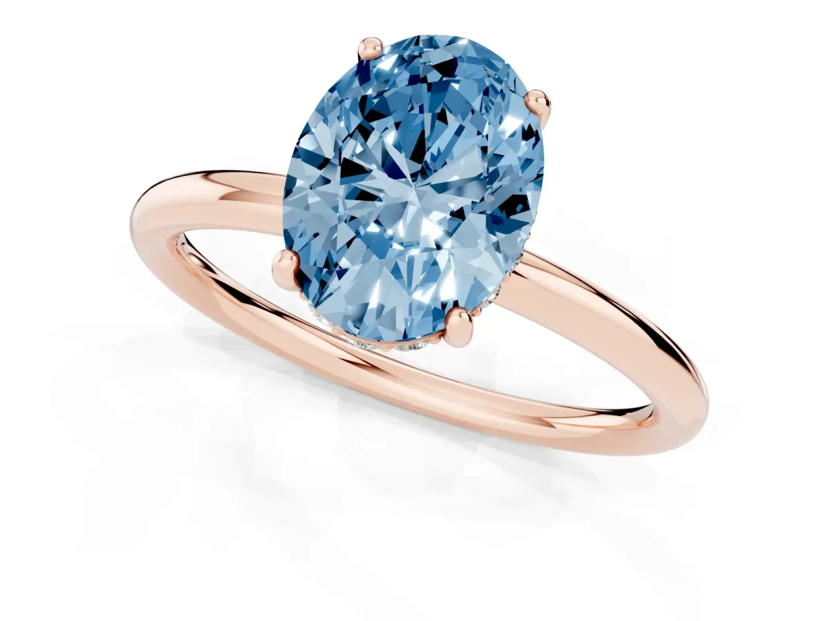 Fancy Blue Oval Cut Solitaire Diamond Ring with a Classic Band and Four-Prong Setting Rose gold
