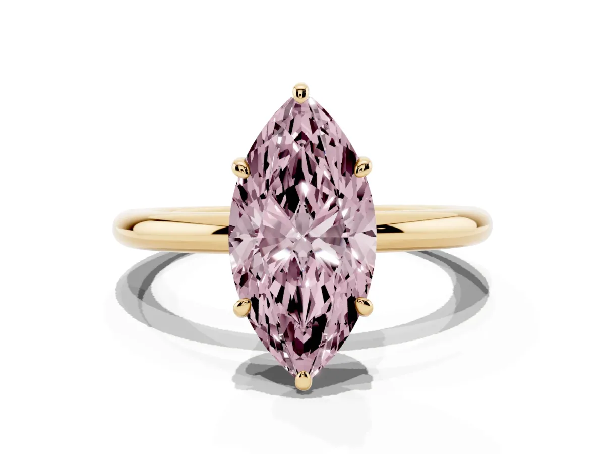 Fancy Pink Oval Cut Solitaire Diamond Ring with Four-Prong Setting on a Plain Band Yellow gold