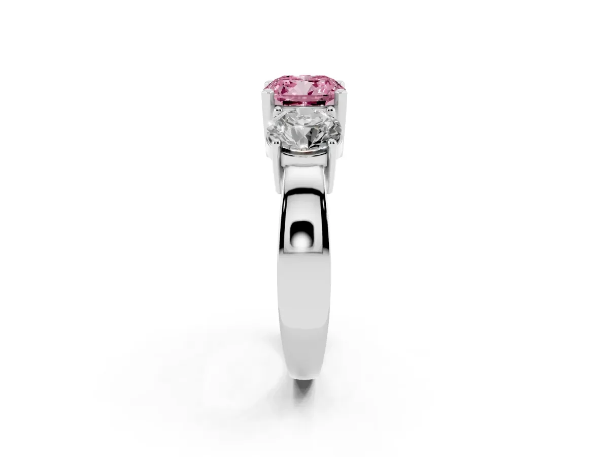 Fancy Pink Three-Stone Cushion Cut Diamond Ring with Round Side Stones, Classic Band, and Four-Prong Setting White gold