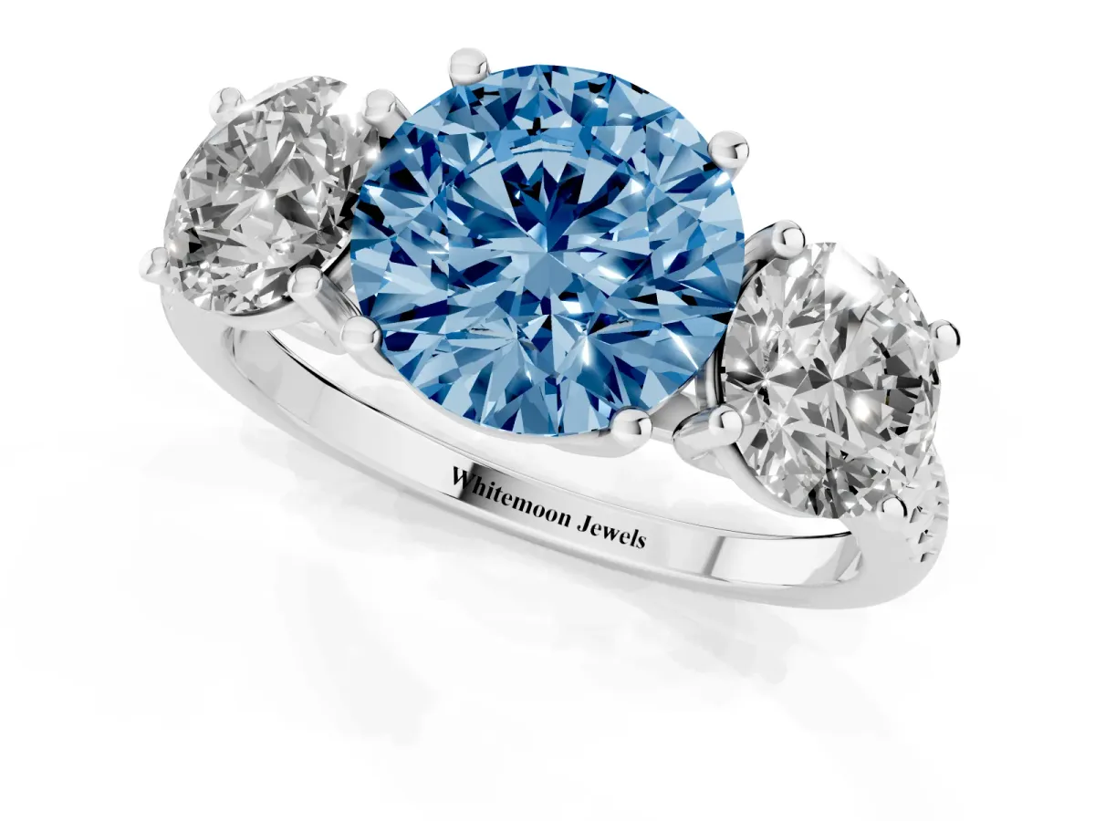 Fancy Blue Three-Stone Round Cut Diamond Ring with Round Pavé Band and Prong Setting Silver