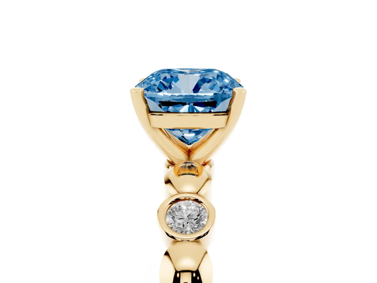 Fancy Blue Cushion Cut Solitaire Bezel-Set Diamond Ring with Beaded Band and Four-Prong Setting Yellow gold