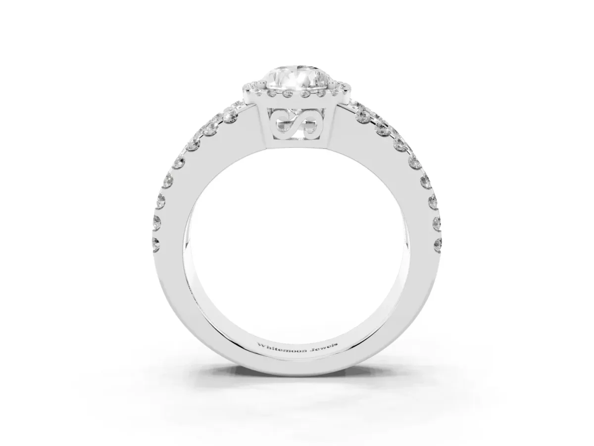 Pear Cut Cut Halo Split Shank Diamond Ring with Four-Prong Setting Platinum