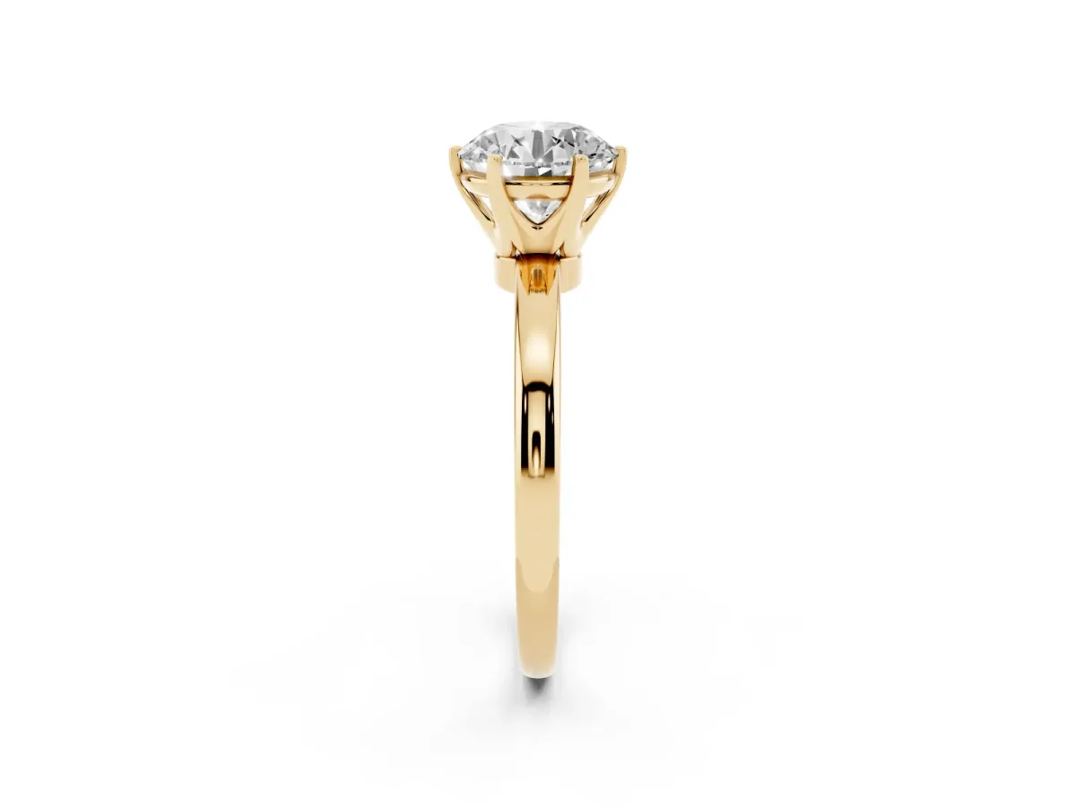 Round Cut Solitaire Diamond Ring with Six-Prong Setting on a Classic Band Yellow gold